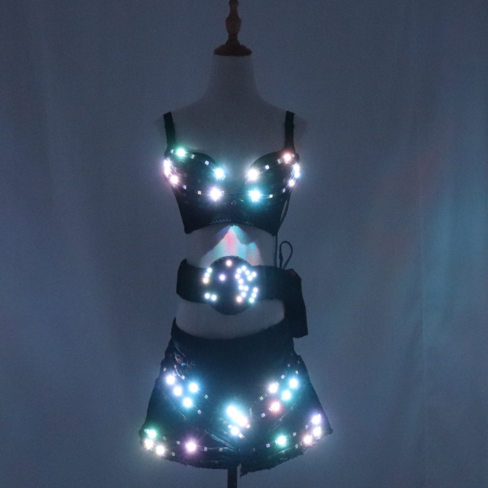 La ragazza sexy della gonna del partito della luce luminosa principale colore pieno ha condotto i costumi chiari